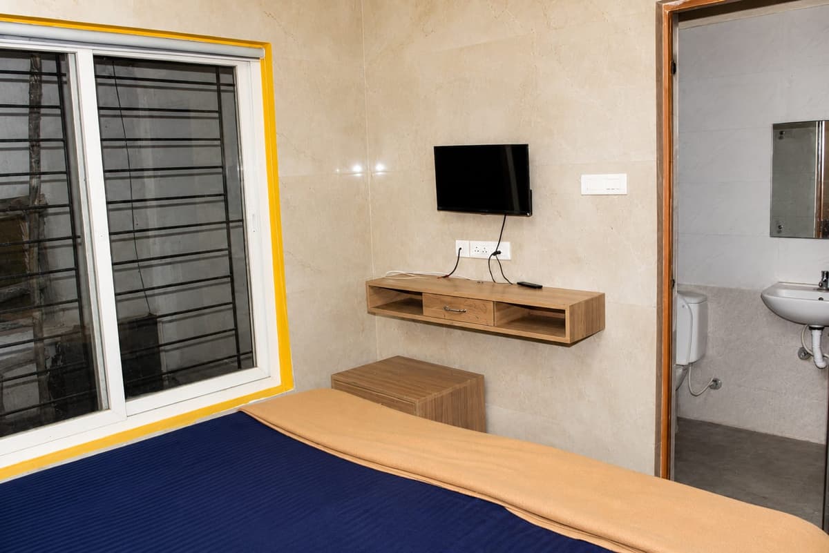 Modern in-room flat-screen TV unit and desk console